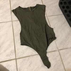 Green body suit with open sides